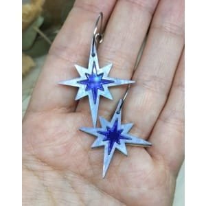 Pendientes Estrella de Navidad de metacrilato efecto espejo y marmoleado, a corte laser, estilo moderno y colorido.