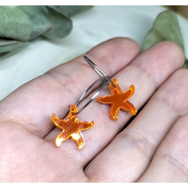 Pendientes Mini Estrella de Mar de Metacrilato, dentro de la colección de verano 2025