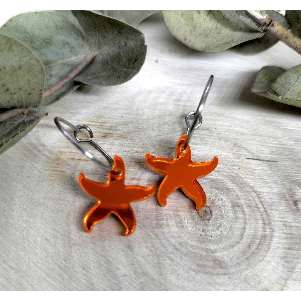 Pendientes Mini Estrella de Mar de Metacrilato, dentro de la colección de verano 2025